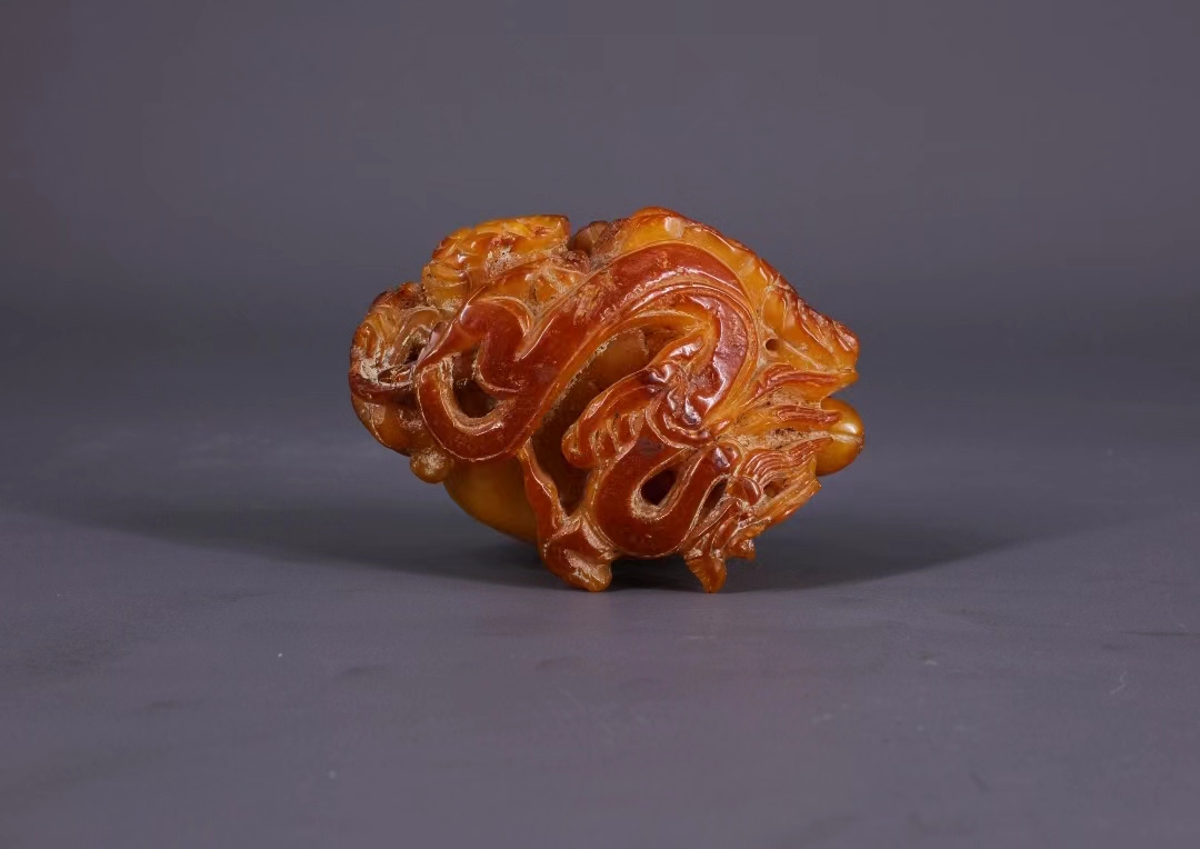 正月初八‖文物贺岁•新春同欢  辽代浮雕双龙琥珀瓶